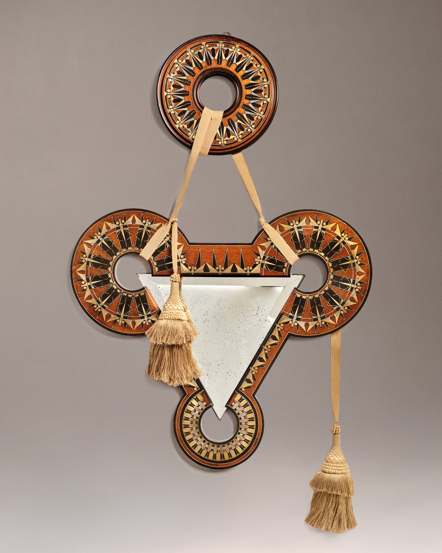 VINTAGE CARLO BUGATTI - A wall mirror