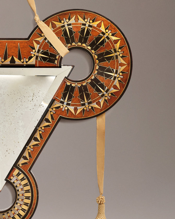 VINTAGE CARLO BUGATTI - A wall mirror